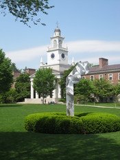 English: A view of Samuel Phillips Hall (background) and the Bicentennial Statue (foreground), at Phillips Academy in Andover, Massachusetts.