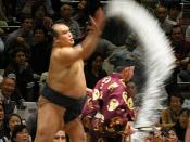 English: Sumo wrestler Kitazakura throws salt before a bout, Tokyo, October 2007 Category:Japanese sumo wrestlers
