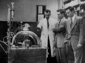 Dr. John P. Merrill (left) explains the workings of a then-new machine called an artificial kidney to Richard Herrick (middle) and his brother Ronald (right). The Herrick twin brothers were the subject of the world's first successful kidney transplant, Ro