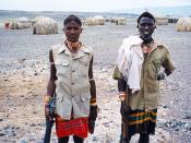 English: Samburu warriors near Lake Turkana, Kenya. עברית: לוחמי סמבורו ליד אגם טורקנה, קניה.