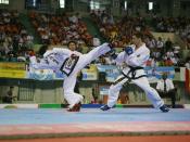 Combate de Taekwondo estilo ITF.