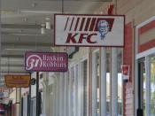 Picture of signs on Kentucky Fried Chicken and Baskin 31 Robins.