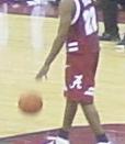 English: Alabama Crimson Tide's Ronald Steele dribbling the ball during an away game against Wisconsin Badgers