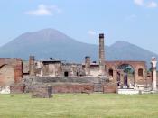 English: Pompeii, with Vesuvius towering above.