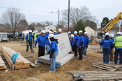 English: VIRGINIA BEACH, Va. (Feb. 2, 2011) Sailors assigned to the aircraft carrier USS Theodore Roosevelt (CVN 71) help build a home for a mother currently raising six foster children. The project is part of an episode of Extreme Home Makeover: Home Edi