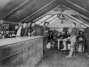 Men gathered for a drink in the Road House Saloon, Bluff City, Alaska