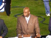 English: Deion Sanders as an analyst for the NFL Network, 2008. Photo courtesy of Michael De Jesus, via Flickr. License has since been changed, but was under CC-BY when uploaded.