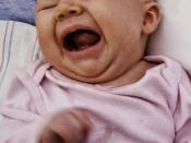 English: A hungry baby yelling and crying.
