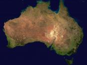 Continent of Australia from space. Australia is a major producer of fossil fuels and has significant problems with deforestation.