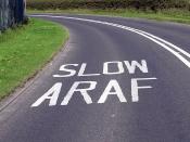 Welsh road markings seen near Cardiff Airport, Wales.
