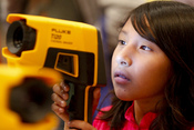 English: RIVERSIDE, Calif. (Oct. 13, 2010) A fourth grade student from Arlanza Elementary School looks through a Navy thermal imager during the 11th annual Science and Technology Education Partnership (STEP) Conference. The event, sponsored by the Naval S