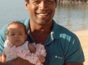 Cropped from Football star/actor/accused murderer O.J. Simpson, with his daughter, Sydney Brooke Simpson, at the Kahala Hilton Hotel in Honolulu, Hawaii.