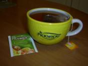 English: A cup of Picwick tea in a promotional Picwick mug.