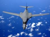 Soaring OVER THE PACIFIC OCEAN -- A B-1B Lancer drops back after air refueling training Sept. 30. The B-1B is deployed to Andersen Air Force Base, Guam, as part of the Pacific Command's continuous bomber presence in the Asia-Pacific region, enhancing regi