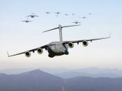 Thirteen C-17 Globemaster III aircraft fly over the Blue Ridge Mountains in Virginia during low level tactical training Dec. 20, 2005. These C-17 planes are assigned to the 437th and 315th Airlift Wings at Charleston Air Force Base, S.C.
