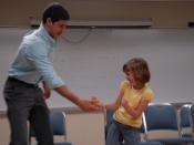 English: Emily Chrisman and teacher Joseph Pascetta role play a situation during the Oct. 10, 