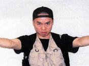 One of the photographs of Seung-Hui Cho that he sent to NBC News on the day of the massacre