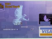 Photo of a RBC Visa taken under a UV light to show the florescent Visa Bird.