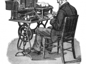 A 'G' (Graham Bell) model Graphophone being played by a typist after it had recorded dictation.