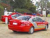 English: Three Australian Federal Police, Ford BF Falcon MkII XT, cars.