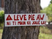 English: Sign in Guadeloupe creole on tree in a residental area (Lamarre, unincorporated) near Sainte Anne, Guadeloupe, France. Traduction: 