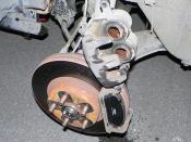 English: Twin-pot disc brake calliper(Twin-pot front disc brake calliper from a JDM 1996 Subaru Legacy GT)