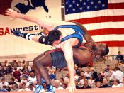 Byers determined to wrestle another Olympics before coaching 110215