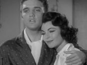 Screenshot of Elvis Presley and Judy Tyler from the trailer for the film Jailhouse Rock