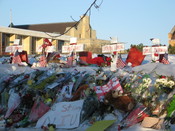 Crosses, flowers, signs, and other items left at a makeshift memorial site established near the MLK Commons at Northern Illinois University within a week of the February 14, 2008 shooting at NIU which killed six and injured 18 people.