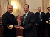 English: WASHINGTON (March 9, 2010) Chief of Naval Operations (CNO) Adm. Gary Roughead is presented the Optimas Award in General Excellence by Todd Johnson, publisher of Workforce Management Magazine. The award recognizes the Navy's continued commitment t