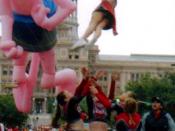 A cheerleading stunt during a parade in Austin Texas.