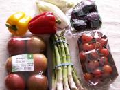 English: A picture of a collection of healthy (low-calorie) snacks. These include (from left to right): paprika, endives, beetroots, apples, asperges, and cherry tomatoes