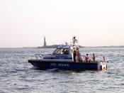 English: A NYPD patrol boat in the New York Harbor. Photograph taken Fourth of July, 2005. The vessel was named for Raymond Cannon, an officer of the 69th precinct who was fatally shot responding to an armed robbery on April 27, 1994.