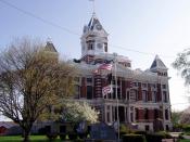English: Front of the Johnson County Courthouse, located on Courthouse Square in downtown Franklin, , . Built in 1879, the courthouse is part of two historic districts that are listed on the : the and the .