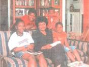 scan of poster featuring the Florida Academy of African-American Culture that was founded by Ruby Woodson in Sarasota, Florida - she is seen seated with children visiting its African-American Culture Research Center and Library