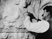 English: Cathedral of St. John the Divine — A stone sculptor working on a capital with an angel