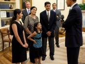 English: President Barack Obama greets Kavya Shivashankar, left, the 2009 Scripps Spelling Bee winner, and her family in the Oval Office, June 3, 2010.