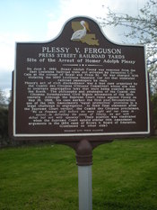 English: Side one of the memorial in New Orleans, Louisianna of the Plessy-v-Ferguson memorial located at the corner of Press St & Royal St
