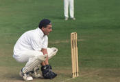 A wicket keeper standing up to a spin bowler... Woore CC, Staffordshire, President's Day 2004. Taken by GWO