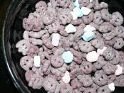 English: Boo Berry breakfast cereal in a black bowl.