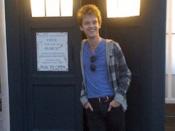 English: Alex Day standing in front of a police box, or Tardis