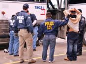 English: ICE Special Agents (U.S. Immigration and Customs Enforcement) arresting suspects during a raid