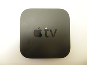 English: The new, second-generation Apple TV. This is now released, shipping product which is in customers' hands.