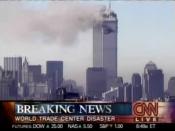 CNN breaking the news of a plane crash at the World Trade Center
