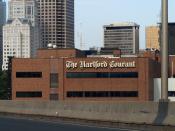 The Hartford Courant building in downtown Hartford, seen from I-84 East.