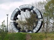 English: Miners wheel. Evans & Bevan, former Welsh Anthracite (coal) mine owners, major employers in the South Wales valleys. Immortalised in this sculpture on the old rail bed at Maesycwmmer. Ocean Coal and Empire Coal, were also large mining companies o