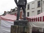 Statue of A E Housman - Bromsgrove High Street - looking at markets