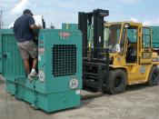 English: Atlanta, Ga., August 28, 2006 - At the Ft. Gillem FEMA Logistics Center, Will Rodriguez, Inventory Management Specialist (IMS) makes a final check on an 80 KW generator before it is loaded on a truck to be deployed to a staging area until need de