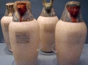 Canopic jars of Neskhons, wife of Pinedjem II. Made of calcite, with painted wooden heads. Circa 990-969 BC. On display at the British Museum.