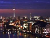 English: Berlin at night. Seen from the Allianz building in Treptow, showing the Universal building on the right at the river Spree and the TV-Tower at Alexanderplatz